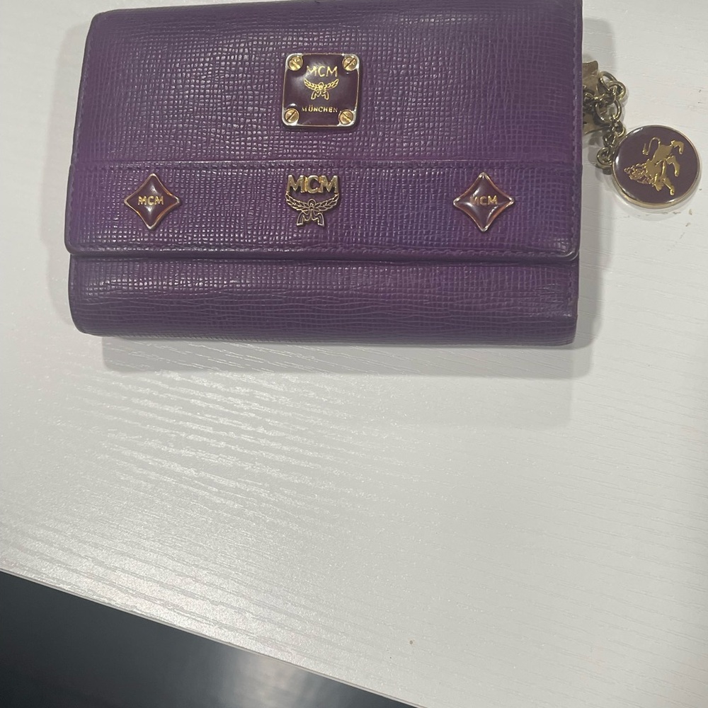 MCM Purple Leather Trifold Wallet with Gold Accents and Charm